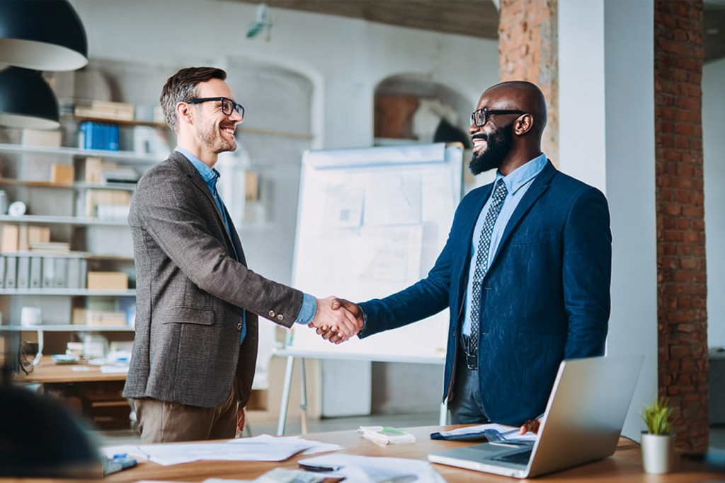 punklexa_httpss.mj.run0-3EftFwl68_two_businessmen_shaking_han_be364673-dcde-438b-9362-5d8c9d8d40f5_2.png